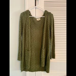 Green knitted cardigan